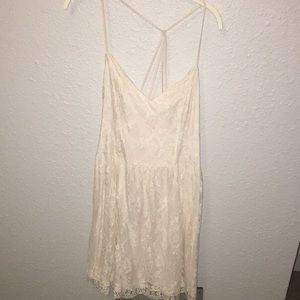 Cream lace dress with strappy back